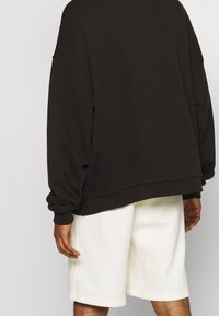 Be Edgy Sudadera - black