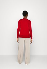Lindex Neule - red
