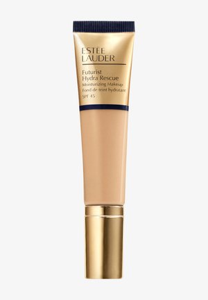 Tube van Estee Lauder Futurist Hydra Rescue make-up, beige kleur, gouden en marineblauwe accenten, SPF 45, gladde textuur, formule met vochtinbrengende eigenschappen.