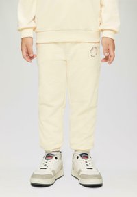 s.Oliver JOGGING MIT KLEINEM PRINT DETAIL - Trainingsbroek - helles sand