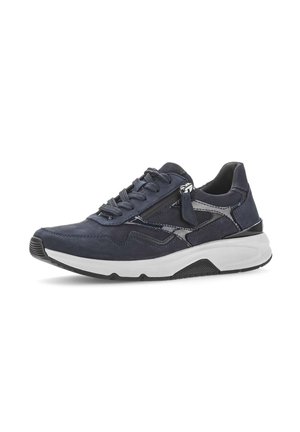 Navy blue sneaker with white sole, black outsole, black zipper on side, and navy blue laces on a white background.