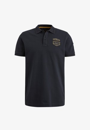 Polo shirt marine en coton avec col, patte de boutonnage à deux boutons et écussons brodés sur la poitrine gauche. Manches courtes, couleur unie.