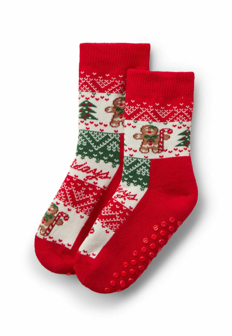 Červené ponožky s vzory perníkových mužíků, vánočních stromků a svátečních motivů. Podešve mají gripové body pro lepší přilnavost.