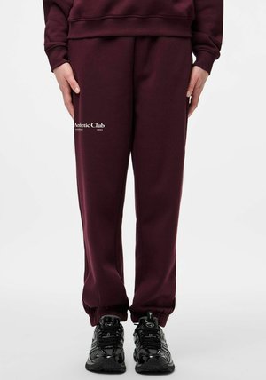 - Spodnie treningowe