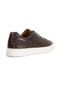 Brown leather sneaker with woven texture on the side, rounded toe, white rubber sole, and tonal laces. Smooth upper with minimal accents.
