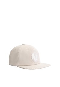 Beige corduroy cap with a flat brim and an embroidered logo on the front. Features five ventilation holes and a textured surface.