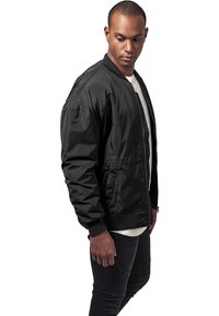Urban Classics OVERSIZED - Pilotska jakna - black