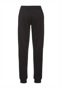 Schwarze Sporthose mit weicher Textur, elastischem Bund und gerippten Bündchen. Hat Seitentaschen und eine taillierte Passform für Komfort.