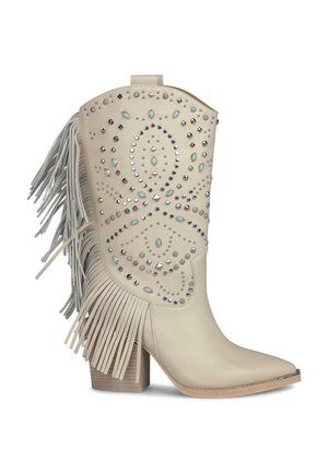 Beige Cowboy-Stiefel mit spitzer Zehe, verziert mit Nieten und türkisfarbenen Akzenten. Hat lange Fransen an der Seite und einen Holzblockabsatz.