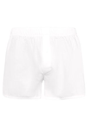 Witte katoenen boxershorts met een elastische tailleband en een knoopsluiting aan de voorkant. De stof lijkt glad en lichtgewicht te zijn.