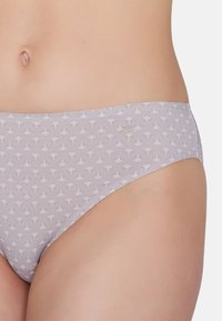 Gray underwear featuring a repeating fan pattern in white, with a soft texture. The waistband sits just above the hips.