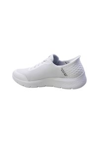 White athletic shoe with a breathable mesh upper, textured heel, and smooth sole. Features laces and logo detail on the side.