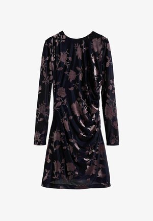 Long-sleeve black dress with dark purple floral velvet pattern and draped detailing on the front.