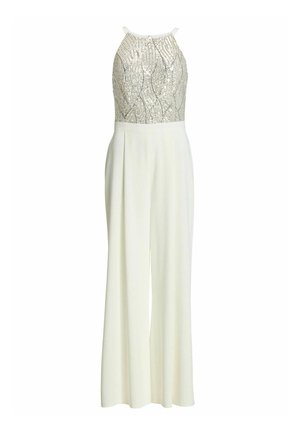 Combinaison blanche sans manches avec jambes larges et un col montant orné de motifs en sequins dorés sur le corsage.