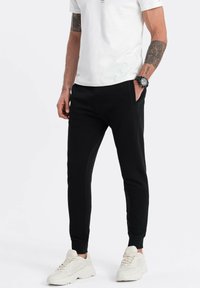 Ombre Jogginghose - black