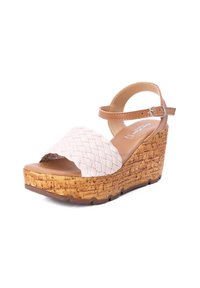 Tomaia beige intrecciata con un tacco a zeppa in sughero. Cinghia attorno alla caviglia con fibbia. Suola morbida per il comfort. Design piattaforma per un'altezza aggiuntiva.