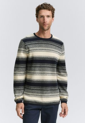 Pullover trui in cream, marineblauw en grijs met horizontaal gestreept patroon. Gebreide textuur en ronde halsontwerp, met geribbelde manchetten en onderrand.