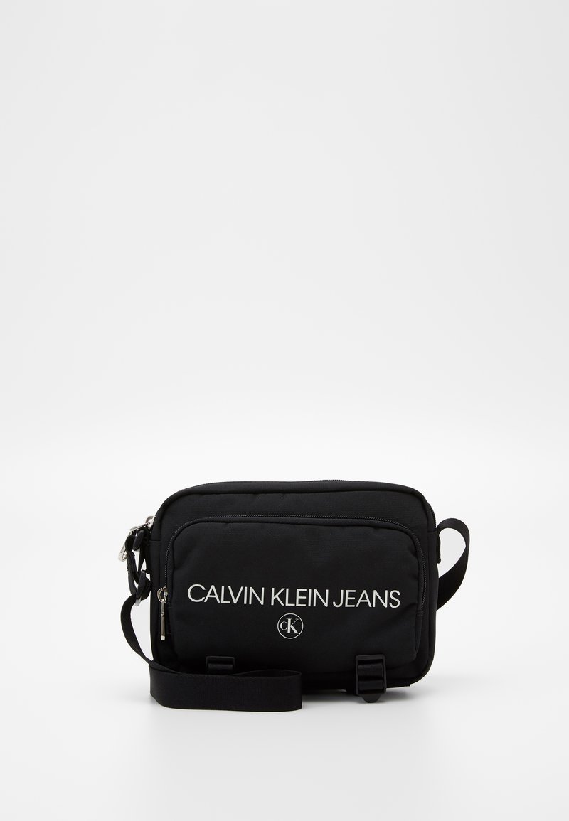 Calvin Klein Jeans CAMERA BAG Sac bandoulière black/noir ZALANDO.FR