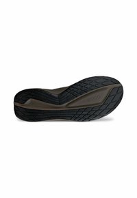 Sohle eines Schuhs aus strukturiertem schwarzem Gummimaterial, mit einem gemusterten Profil für Grip und einem glatten braunen Akzent entlang des Randes.