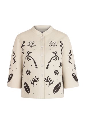 Giacca crema con bottoni, ricamata in nero con palme, sole, foglie e motivi floreali, caratterizzata da maniche a tre quarti e colletto rotondo.