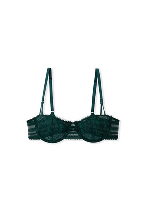 Reggiseno verde in pizzo con coppe a sostegno, dotato di spalline regolabili e bordo decorativo in pizzo. Accenti in tessuto a righe sui lati.