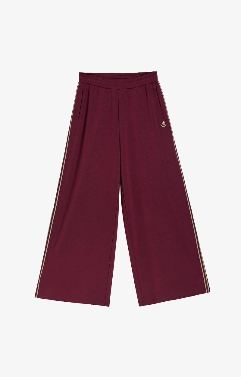 Szerokie bordo spodnie z beżowymi bocznymi paskami, elastycznym pasem, bocznymi kieszeniami i małym haftowanym logo na prawej udzie.