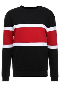 Felpa nera con maniche lunghe, caratterizzata da strisce orizzontali rosse e bianche sul petto e sulle maniche. Materiale in cotone con collo tondo.