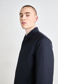 Calvin Klein TRAVEL TECH CARCOAT - Cappotto invernale - calvin navy