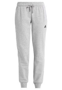 Szare dresy wykonane z miękkiego materiału, z regulowanym paskiem w talii, bocznymi kieszeniami i czarnym logiem Adidas na udzie.