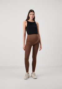 MAMALICIOUS MLTIA JEANNE - Legging (type pantalon) - pinecone