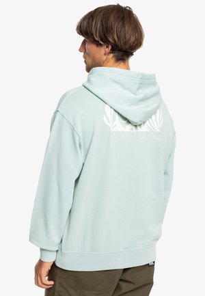 Light blue hoodie with a large white graphic design and logo on the back. Made of soft material, featuring a spacious hood and ribbed cuffs.