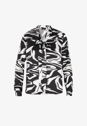 Bluză cu mânecă lungă, alb-negru, cu un model abstract de ondulații, dintr-un material satinat, cu decolteu în V și un șnur pentru legare, și manșete elasticizate.