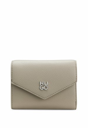 Beige textured leather wallet with a silver logo, featuring a flap closure and a triangular design on the front. Compact and rectangular shape.