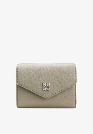 Beige textured leather wallet with a silver logo, featuring a flap closure and a triangular design on the front. Compact and rectangular shape.