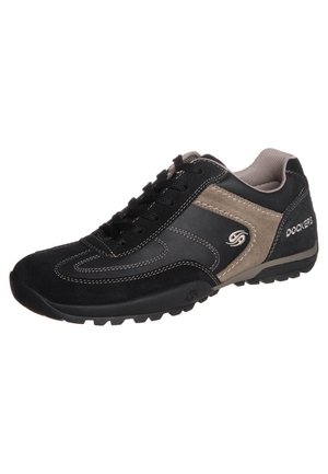 Zwart-beige Dockers casual sneaker met vetersluiting, rubberen zool en logo aan de zijkant en hiel.