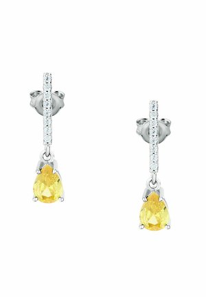 Orecchini a forma di goccia gialla con montatura in argento, decorati con una fila di piccoli cristalli trasparenti sopra la pietra principale. Superficie liscia e finitura lucida.