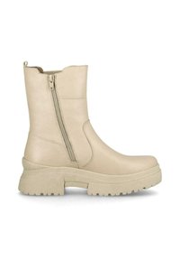 Bottine beige avec une finition en cuir lisse, fermeture éclair sur le côté et semelle en caoutchouc épaisse présentant des accents texturés.