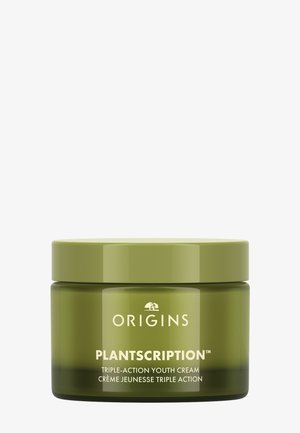 Groene pot van Origins Plantscription drievoudige werking jeugdcrème met bijpassend deksel op witte achtergrond.