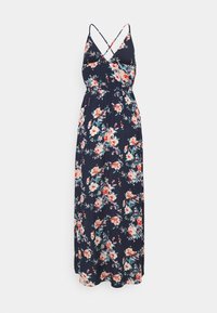 Robe maxi bleue marine à fleurs avec bretelles spaghetti et design croisé dans le dos, ornée de grandes fleurs rose clair et bleues sur un tissu léger.