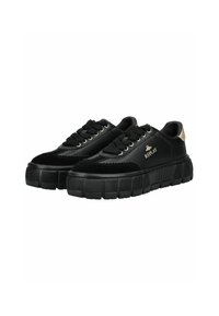 Black sneakers with a chunky sole, featuring a mix of suede and smooth materials. Accented with silver hardware and a logo.