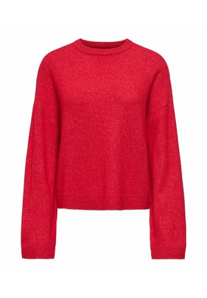 Punane kudumiga kampsun, millel on pikad varrukad, ümar kaelus ja lõdvalt istuv lõige. Pehme tekstuur kergelt laigulise mustriga üle kogu pinna.