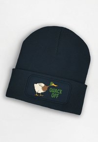 Navy ribbed beanie featuring an embroidered patch with a duck illustration and the text "QUACK OFF" in green. Soft knit material.