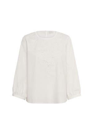 Weiße Bluse mit langen Puffärmeln und einem runden Ausschnitt. Merkmale sind bestickte Details auf der Vorderseite und ein Schlüssellochverschluss im Rücken.