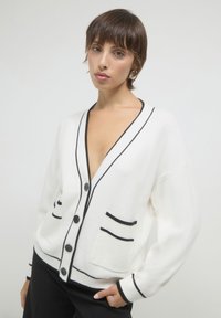 Calliope Strickjacke - bianco