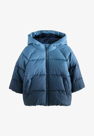 Sinisävyinen puffer-takki, jossa on huppu, vetoketjusuljenta ja sivutaskut. Valmistettu pehmeästä, tikatusta materiaalista, jossa on sileä pinta.