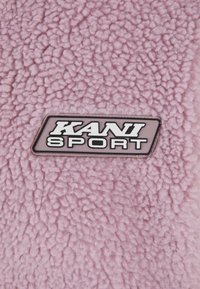 Karl Kani Flisinė striukė - rose taupe