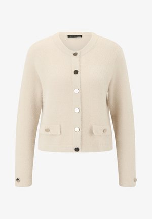 Kremowy kardigan o teksturze z okrągłym dekoltem, z przodu srebrne zatrzaski, dwa kieszenie z klapami z guzikami oraz długie rękawy z detalami guzikowymi.