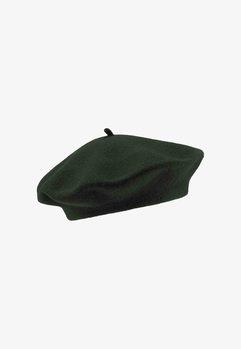 Vihreä villaberet, joka on pyöreä, litteä muoto ja hieman notkolla. Siinä on pieni pääsolmu ja pehmeä, tekstuurinen pinta.