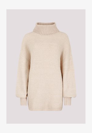 Beige, übergroßer Strickpullover mit geripptem Rollkragen, überschnittenen Schultern, Ballonärmeln und eng anliegenden gerippten Ärmelbündchen.