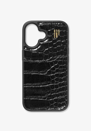 Juodas krokodilo odos rašto telefonų dėklas su blizgiu paviršiumi. Yra išpjova kameros ir auksinė ženklų logotipui. Patvari plastikinė medžiaga.